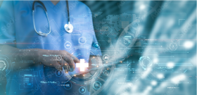 A doctor looks at a clipboard; network technology symbols are superimposed over the image.